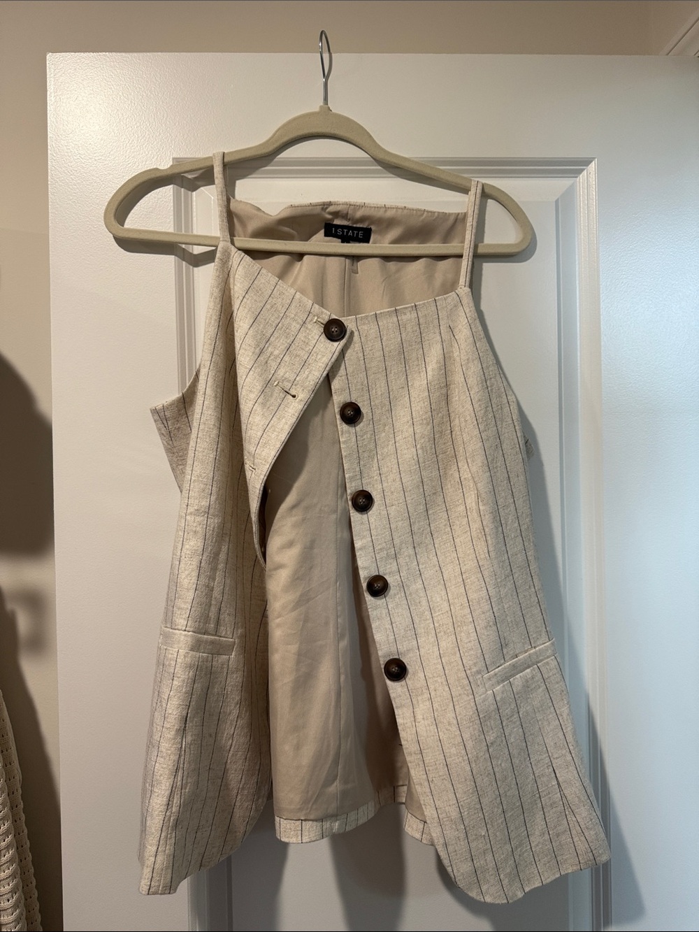 1. State button vest shirt